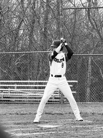 Wildcat sophomore Jacob Frisch locks into his stance at the plate looking to collect a base hit.  Photo courtesy of Laura Frisch.
