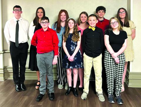 Sharp Middle School Family Career Community Leaders of America students are dressed and ready to attend the State Leadership Conference awards banquet last month in Louisville. Photos by Hannah Thomas.