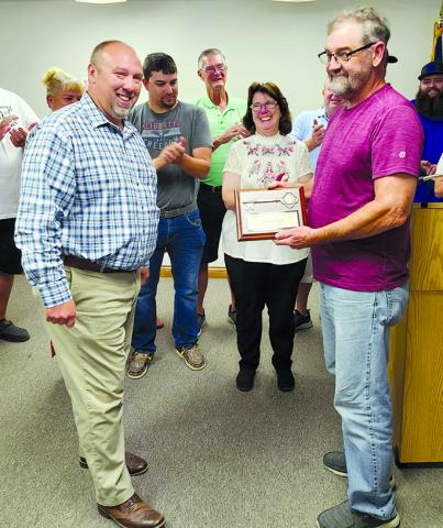 Gary Lea is presented with a key to the city.