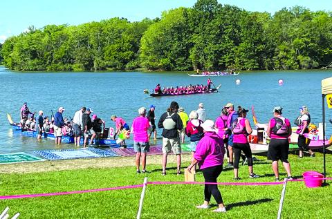 Dragon boats take to the water at A.J. Jolly Park. Photo by Nila Harris