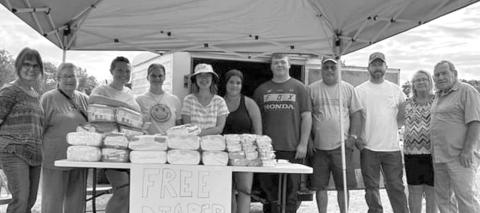 Members and youth from New Zion Baptist Church give away free diapers to parents in need.