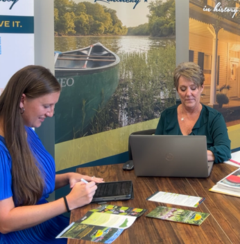 Beka Burton, left, and Tami Vater collaborate to pave the way for an community assessment project. Photo courtesy of Tami Vater..