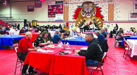 Approximately 35 military veterans and their guests were treated to a meal and entertainment last Monday, Veterans Day, at Pendleton County High School. Students at all four county schools participated in thanking veterans for their service. Photo by Nila Harris.