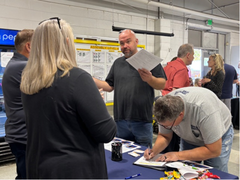 James Mayfield and Danny Teegarden, current Hammer Strength employees, attended the career and resource expo yesterday to determine the needed educational opportunities to make them more employable. Photo courtesy of Sen. Shelley Funke Frommeyer.