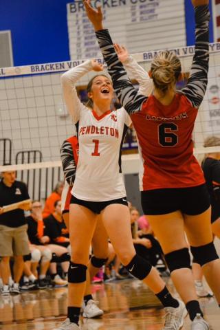 Madison Verst (1) celebrates with Pendleton County High School teammate Jayla McIlvain (6) during the volleyball regional tournament last week at Bracken High School. The Ladycats made history when they picked up a first round win over the Augusta Lady Panthers. It was the first time in 11 attempts that Pendleton County picked up a win in regional action. The Ladycats lost to eventual champions Scott High School in the regional semifinal game. The Ladycats finished their volleyball season with a 22-7 record