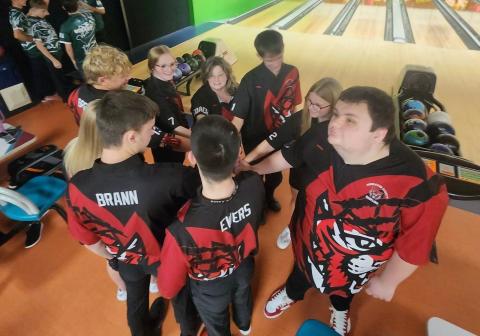 The Pendleton County bowling team gathers for some final instructions before taking on Bishop Brossart at Southern Lanes in Alexandria on November 22.  Photo provided by Rhonda Hutchison.