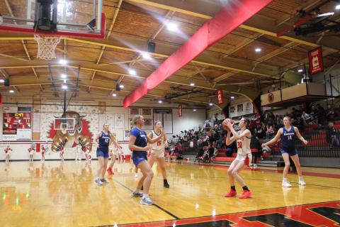  Sophomore Hannah Spaulding spots up for a baseline jumper in the home win over Bluegrass United.  Photo by Sam McClanahan