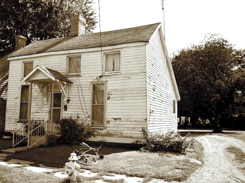 This is an archive photo of the house built at 108 Montjoy St., Falmouth, by former slave Charity Southgate after she bought the lot 1845. She also built several other houses within the block, known as Happy Hollow, for her children and grandchildren. The house was added to the National Register of Historic Places in 1983, but was demolished after the flood of 1997.