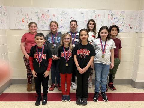 The Northern Elementary School academic team is, back row from left, is Jazzlynn Jones, Parker Blau, Larkin McCain, Evelyn Jones and Jeremiah Wrightsman, and in the front row from left, Nolan Mullins, Wilhelmenia Hamilton, Harper Purvis and Maya Jacobs. Missing from the photo are Blake Barnhart, Archer Jones, Lincoln Stephens and Beulah Gillespie.   Photo courtesy of Jennifer Redden.