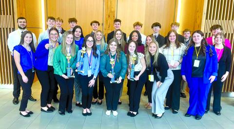Twenty-six Pendleton County High School DECA students presented projects at the DECA state conference March 3 in Louisville. Eighteen of the 26 advanced to the second-round competition, and six students will be traveling to Disney World next month to compete at the DECA International Career Development Conference. Photos courtesy of PCHS teacher and DECA sponsor Haley Slover. 