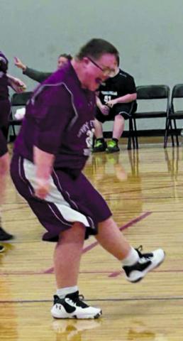 Sam Bryant of Falmouth grooves with a celebratory dance after scoring a basket during the Special Olympics state basketball tournament this month in Louisville. “His celebration dances are the best,” coach Beverly Bass said.