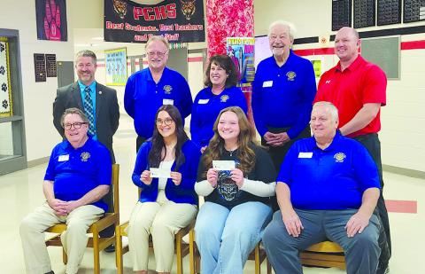  Seated, from left, are Rotarian Dan Woodhead, Adyson, Natalie and Rotarian Darryl Ammerman. Standing are Superintendent Joe Buerkley, Rotarians Neil Belcher, Mary Edith Hillemeyer and Duke Hamilton, and high school Principal Chad Simms. Photo by Burton Cole.
