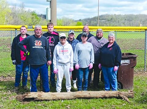 The cleanup crew included, back row from left, Anthony Barlow, Tevin Mudd, Sadie Turner, Randy Wells and Dustin Robbins, and front row, Ronnie Mudd, Selena Mudd, Karen Davis and Janice Polley.  Photo by Sam McClanahan.
