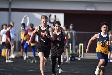 PCHS Track members Sam Hodge, left, and Kai Ledone, right, compete in the  Unified 2x50 meter relay. Photo courtesy of Jennifer Redden.