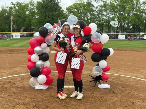 Ladycats Fastpitch Softball seniors Madison Verst, left; and Logan Cooper, right, were recognized along with their families during "Senior Night" activities prior to the start of the May 12 home matchup versus Grant County.  Photo by Sam McClanahan.