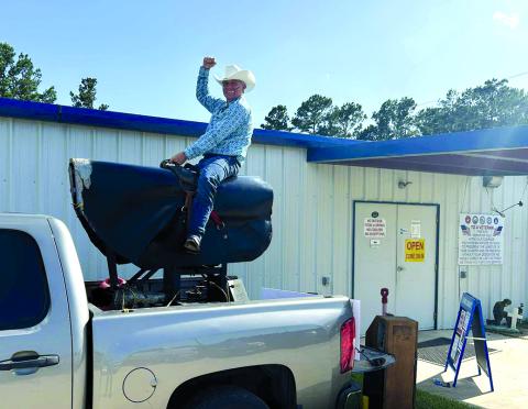 Gale Gregg of Falmouth rides El Toro, a backup mechanical bull for the 1980 film “Urban Cowboy” outside of the VFW where the Gilley’s Urban Cowboy Reunion Party was held on June 7 in Livingston, Texas. Picture courtesy of Gale Gregg.