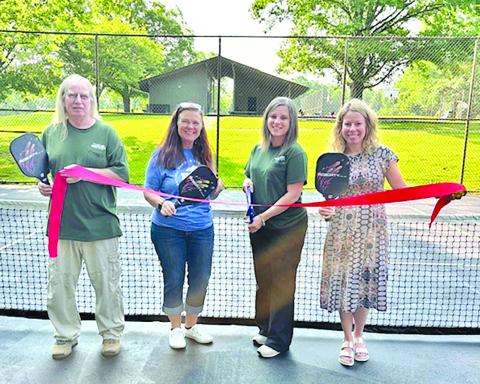 A ribbon cutting took place at Kincaid Lake State Park  recently to celebrate the debut of new Pickleball courts. Pictured left to right: Bucky Field, Kenna Knight, Meredith Crawford, and Natasha Trauth.