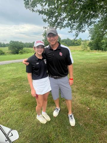 Taylor Bruener along with her father and first-year Ladycats head golf coach Adam Bruener were all smiles following her showing at the Beechwood Invitational on July 28. Bruener shot a new career-low of 76 which tied her for fifth overall. Photo courtesy of Maria Bruener.