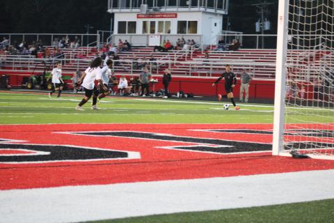 Wildcat Senior Jacob Frisch scans the field for an open teammate during the Wildcats home win over Owen County on September 9. Frisch would finish with three assists on the night. Photo by Sam McClanahan