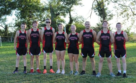 Members of the Cross Country program pose during their meet in Paris. From L-R: Levi Wolfe, Ben Brossart, Klaber Wolfe, Catalina Furman, Aryanna Soden, Josiah Hurdle, Kieran Brayton and Isaac Mardis. Photo courtesy of Natalie Wolfe.
