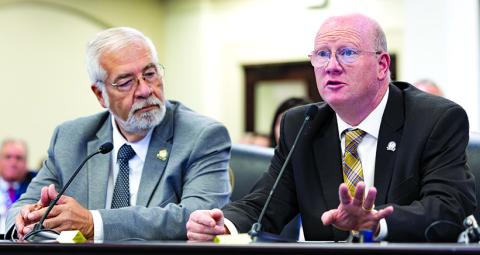 Sen. Greg Elkins, R-Winchester, left, and Rep. Mark Hart, R-Falmouth, tell the Interim Joint Committee on State Government Oct. 21 about their plans to file legislation to remove the state mandate for water fluoridation in 2026.