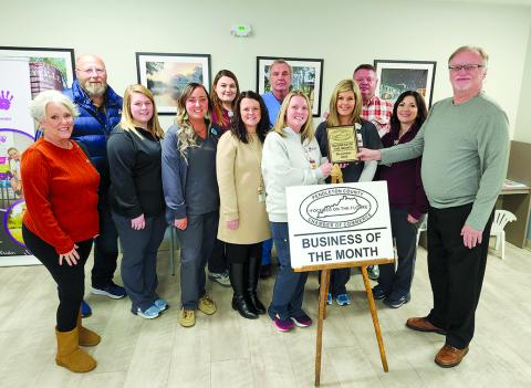 Pictured from left are Tami Vater, Pendleton County economic and tourism development director; Randy Wells, Pendleton County Chamber; Lindsey Stone, Hannah Gaunce and Patience Cooper, medical assistants; Kacey Tucker, business development manager; Dr. Steven Neus; Angela Phelps, LPN, clinic supervisor; Ryan McCandless, patient access; Daniel Klaber, advanced practice registered nurse; Melissa Slade, rural health clinics manager; and Neil Belcher, chamber president.