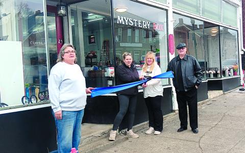 Pictured from left are Jodi Dawson, owner Jennifer Larabee, Tonya Golini and Pendleton County Chamber of Commerce President Neil Belcher. Not pictured are David Larabee and Gayel Bullock. Photo by Sam McClanahan.