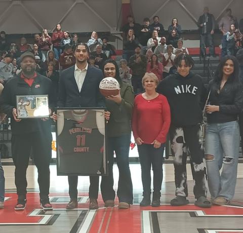 He's pictured with his parents Tony and April Allen-Thomas, grandmother Debbie Allen, and siblings Jalen and Saniah Thomas. Photo by Sam McClanahan.