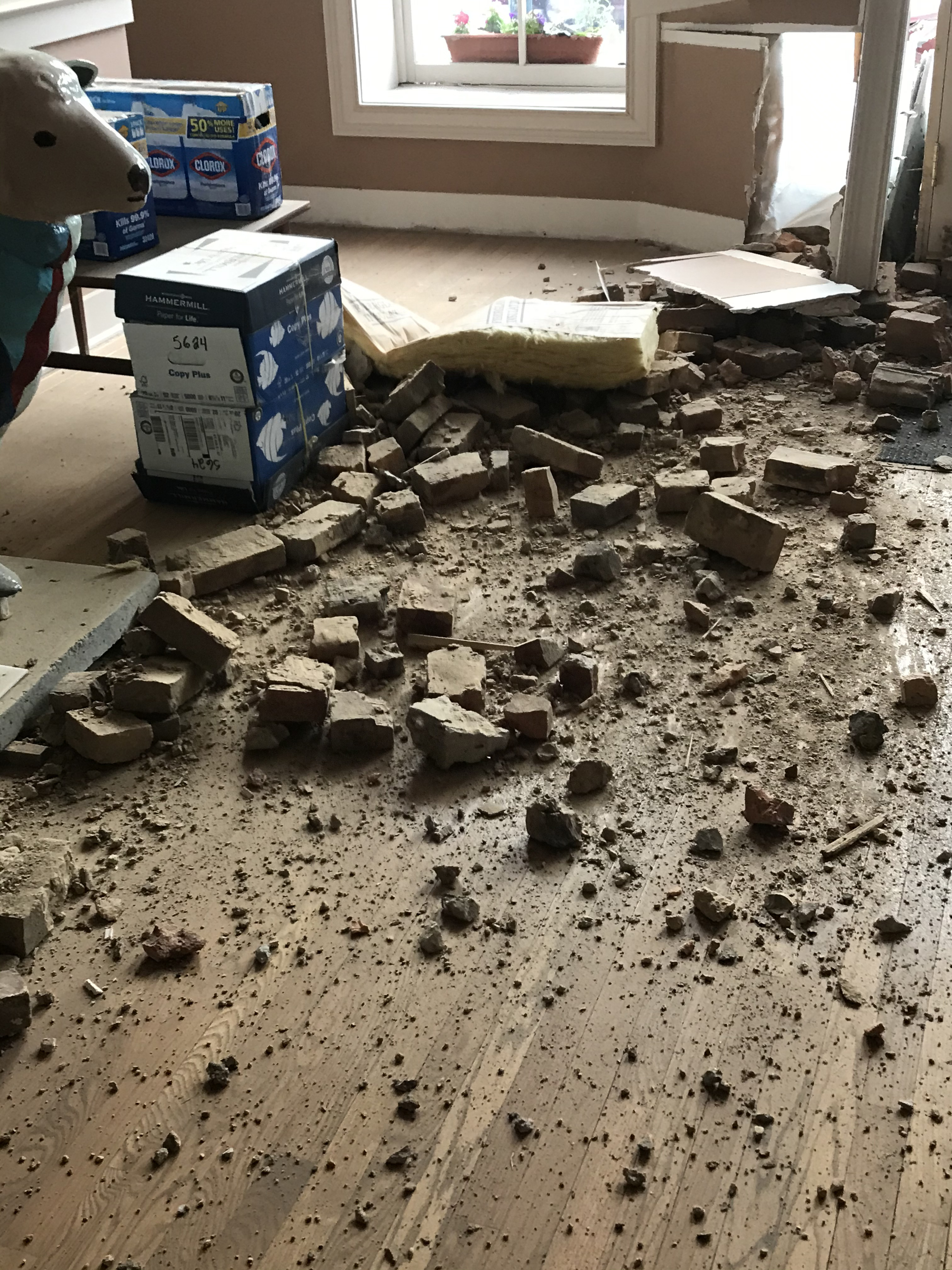 Brick was strewn about on the inside of the building