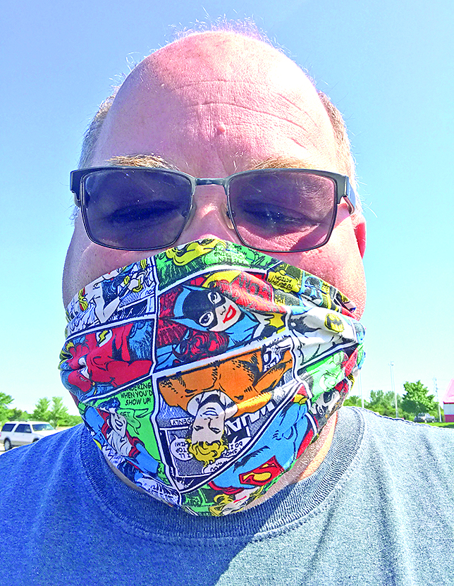 Editor Keith Smith wearing his superhero mask