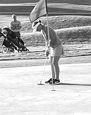 Cailyn Harper watches her putt track the hole