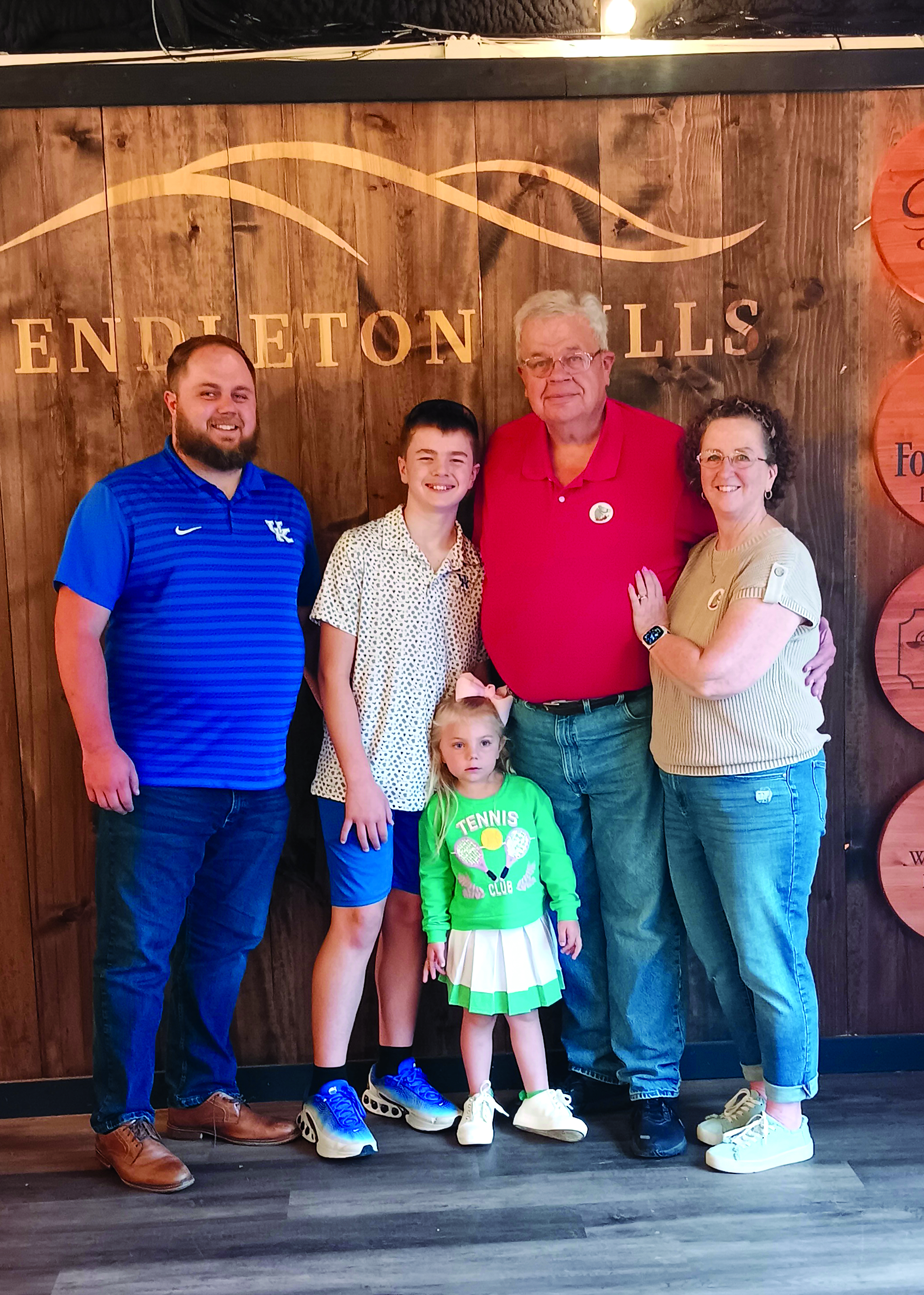 Presumptive Judge Executive-Elect Anthony Strong celebrates his election victory May 19 at the Pendleton Hills Clubhouse with family. From left are his son, Jackson, grandson Ben, granddaughter Lucy, Strong, and wife Teri. Photo by Sam McClanahan.