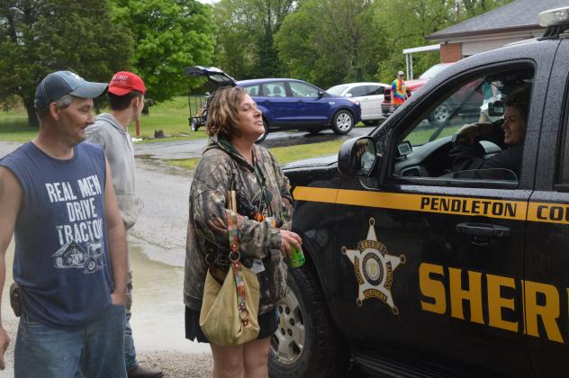 Pendleton County Deputy Sheriff Tish Dietz was talking to Falmouth residents about the flooding