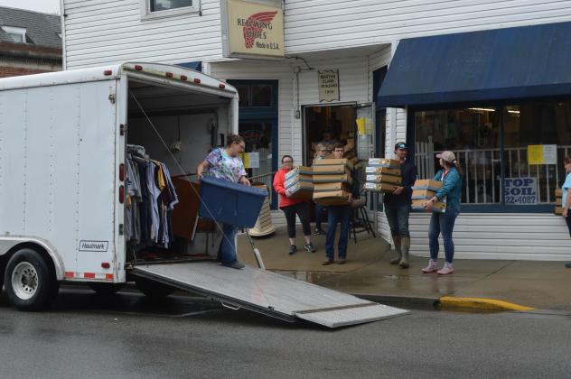 Randy's were hauling out merchandise in preparation of any flooding that might reach their Shelby Street store