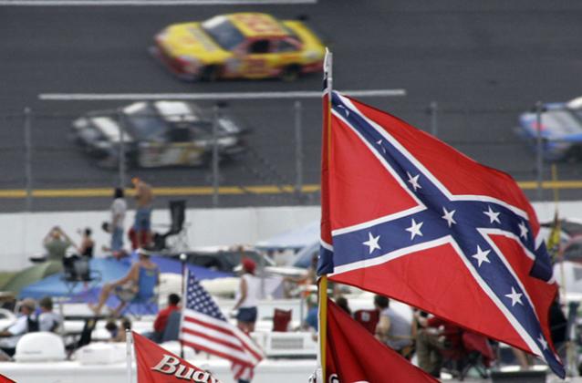 NASCAR moves to prohibit confederate flags at all events and will no longer require personnel to stand during National Anthem. Photo by Associated Press