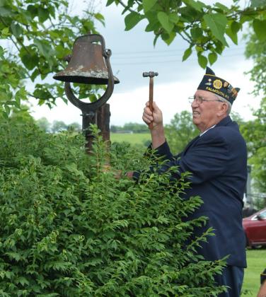 Henry Bertram rang the bell after each name was read during recognition of those who gave their life in WWII