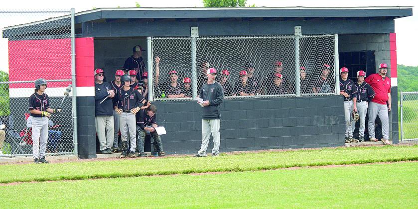 The Wildcats loaded the dugout watching the action on the field