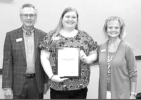 Melanie Hartzel, PC resident and the director of the Pendleton County Tourism Council, received her Elavate graduation certificate Thursday, June 24. Hartzel, center, is pictured with the chair of the board of Leadership Kentucky Dan Bork and Janice Way, an Elevate leader. She says she now has contacts across the state thanks to the Leadership Kentucky initiative. 