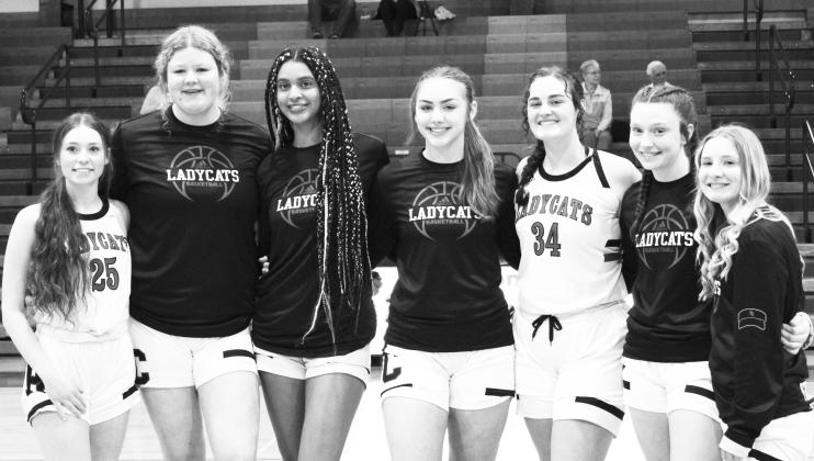 The Pendleton County Ladycats honored their seven Seniors prior to their home victory over St. Patrick on January 21. From left to right: Savannah Shimkowiak, Morgan Hart, Saniah Thomas, Cara Stewart, Kennadi Mayer, Skylar Ashcraft, and Emmie Dunn. Photo by Stacey Myers