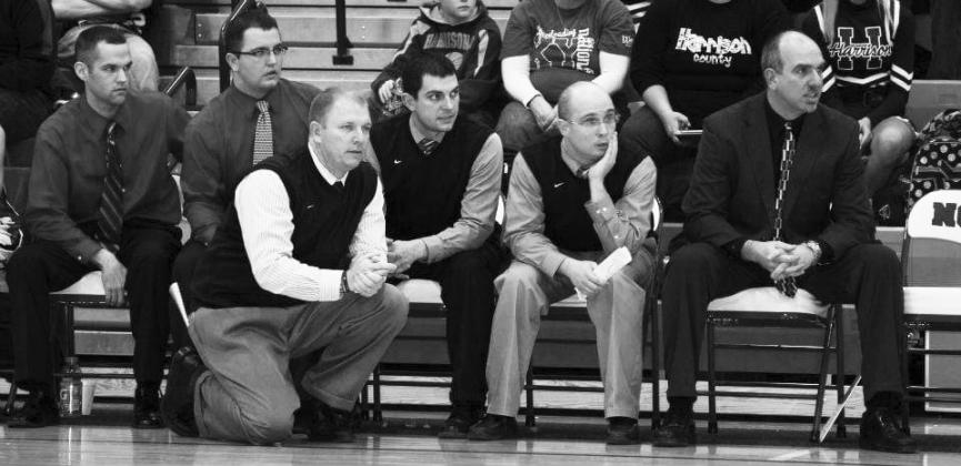 Chad Simms (kneeling) served as head coach of the Pendleton County Wildcats for six seasons where he won 73 games and brought home four district championships. Photo provided by Melody Simms