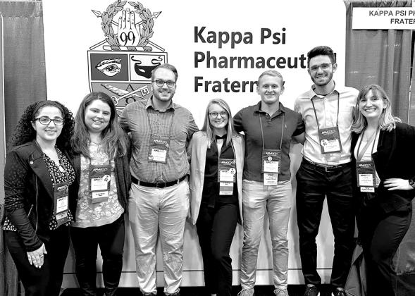 Seth Longworth (third from left) and his team of student pharmacists won Best Overall for their video submission at the APhA conference in Phoenix, Arizona.