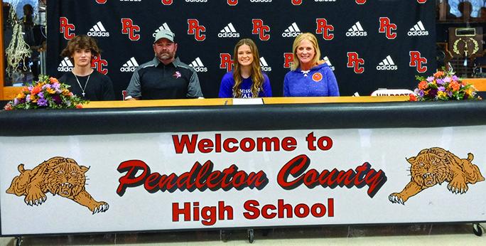 India Trimble signs with Missouri Valley, a college she approached in order to continue her cheerleading career. 
