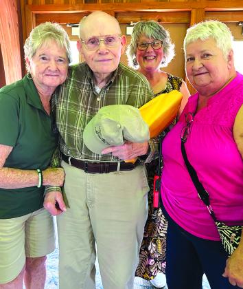 Billy Corbin, an original Kincaid Lake State Park Ranger, is surrounded by current maintenance employee Elsie Daugherty, former employee and Friends of the Park member Amy Hurst, and Mary McDowell. 