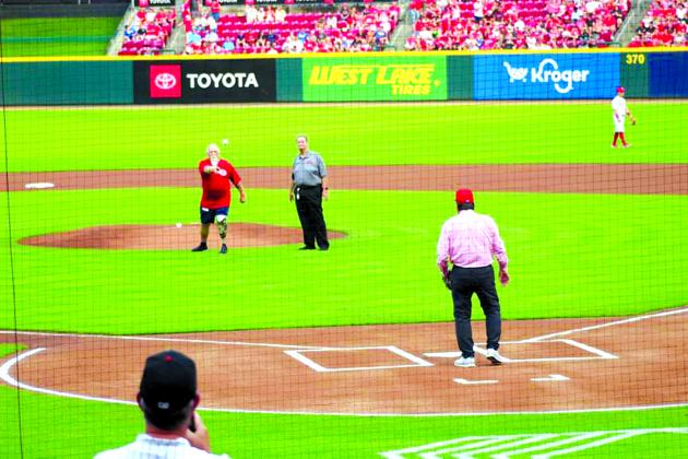 Former Pendleton Countian Rodney Hamilton took part in one of the most unforgettable moments of his life as he was able to throw out the first pitch to his boyhood idol and Cincinnati Reds legend Johnny Bench. Photo courtesy of Micki Hamilton.