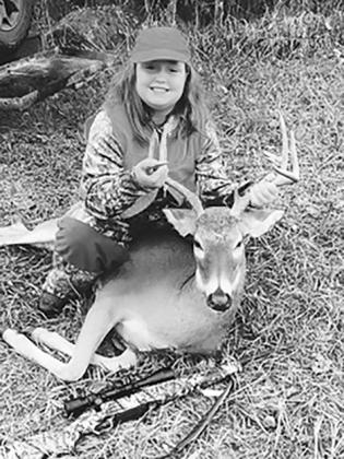 Tinley Quinn, age 9,  got her very first buck
