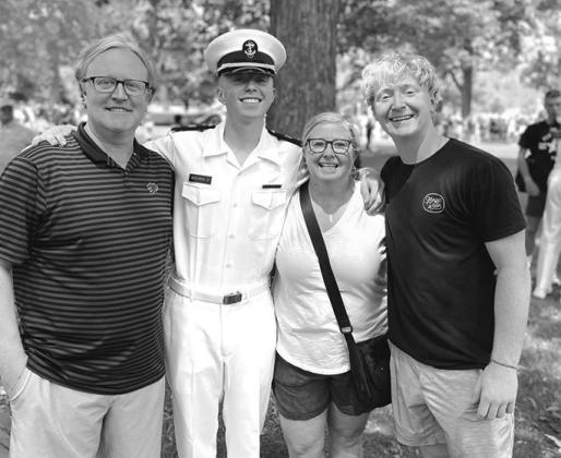 Justin, Brennan, Carrie, and Collin McElfresh are reunited during Parent Weekend at the United States Naval Academy in Annapolis, MD.