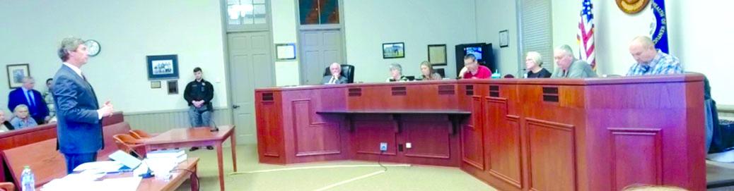 Luke Morgan, an attorney who has been active for more than 35 years, presents the evidence and his legal opinions to Falmouth City Council during the hearing surrounding the impeachment of Mayor Sebastian Ernst. Robert McGinnis, left at the bench, served as presiding officer and mediator of the proceedings. McGinnis is a retired circuit judge for the county, and he served in the same role for the impeachment hearing of former Mayor Elonda Hinson in 2017.