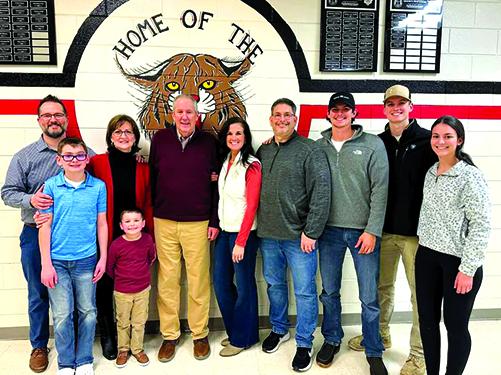 Retired teacher, administrator and coach Steve Craig, fifth from left, celebrates with family Feb. 13 after being inducted as the newest member of the Pendleton County High School Athletics Hall of Fame. 