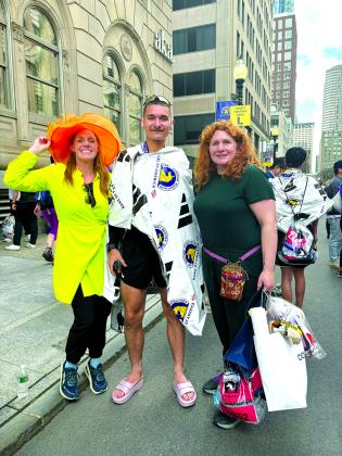 William Burns, 22, of Falmouth, middle, poses with his aunt, Lesha Munich, left, and his mom, Amanda Fitzpatrick, after he completed the Boston Marathon on April 15. Sisters Munich and Fitzpatrick traveled to Boston to cheer on Burns. Photo courtesy of William Burns.