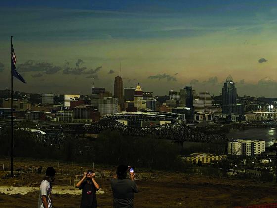 Brian Gregg of Butler and daughter Briana drove to Devou Park in Covington to view the eclipse. Brian took this photo of midday darkness falling over Cincinnati. “It was one of the most impressive things we have experienced with nature,” Gregg said.